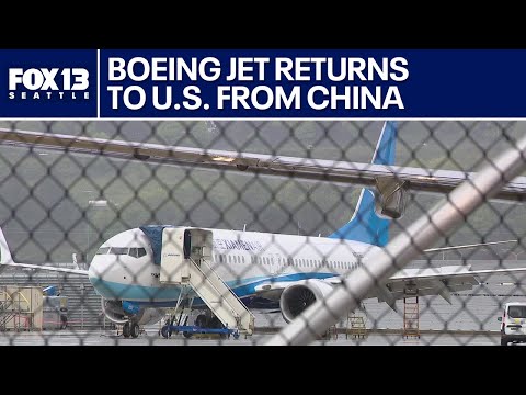 Boeing jet returns to U.S. from China