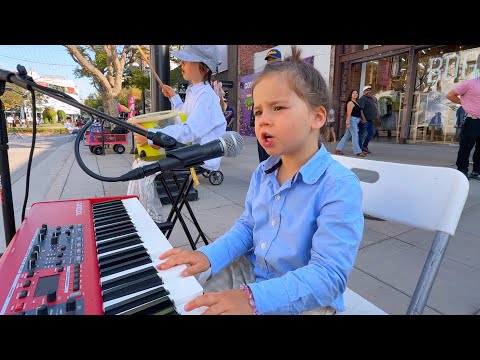 Adorable 4-Year-Old Sings “Baby Shark” in Public — Crowd in Awe When Sister Joins on Violin!